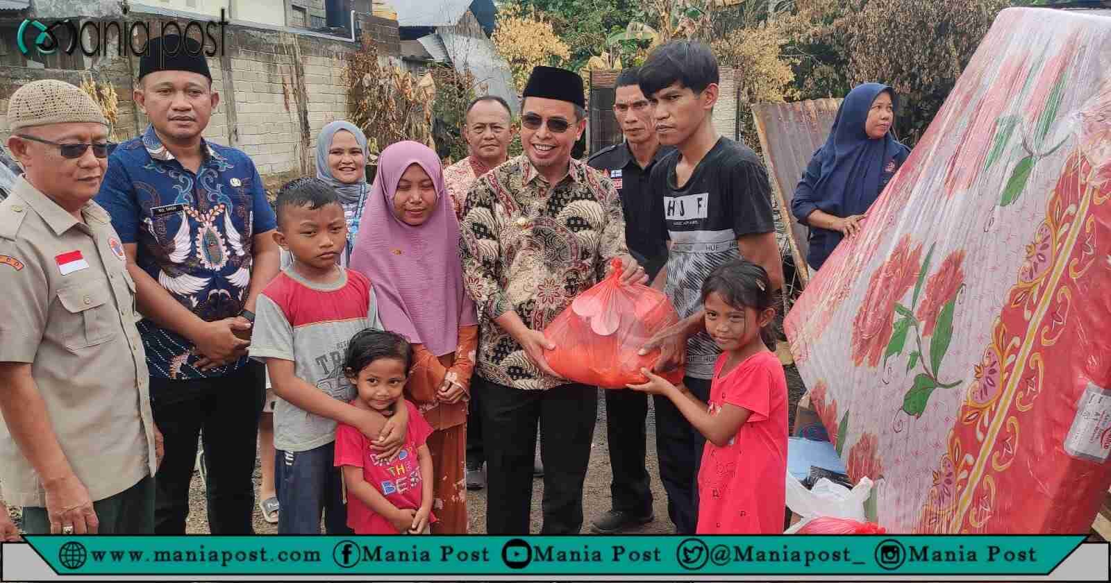 Pemkab Bolmut Salurkan Bantuan Sosial Ke Korban Kebakaran Rumah Boroko Utara